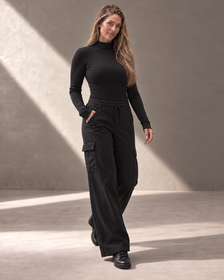 Kinetic Seamless Long Sleeve Top in black showing sculpted corset-inspired ribbing